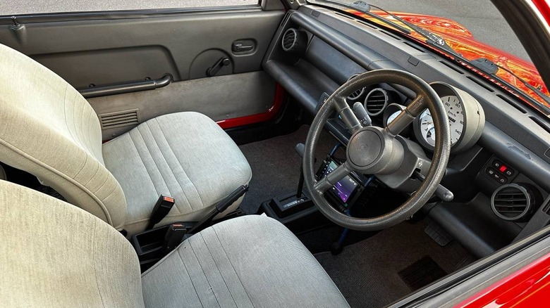 1987 Nissan Be-1 dashboard and front seats image