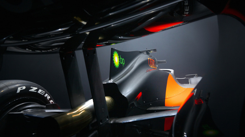 A rear view underneath the rear wing of the Audi R26 F1 car