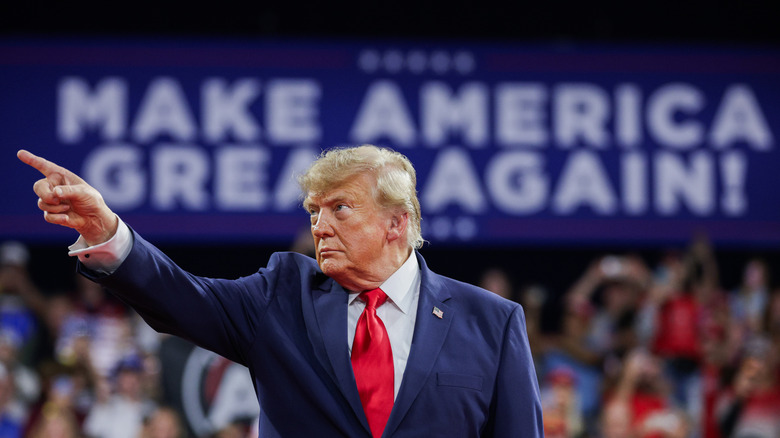 FORT MYERS, FLORIDA - OCTOBER 23: U.S. President Donald Trump gestures to the crowd as he arrives to an election rally at Alico Arena on the Florida Gulf Coast University campus on October 23, 2026 in Fort Myers, Florida. President Trump traveled to Florida to rally for local Republican candidates ahead of next week's midterm elections. (Photo by Alex Wong/Getty Images)