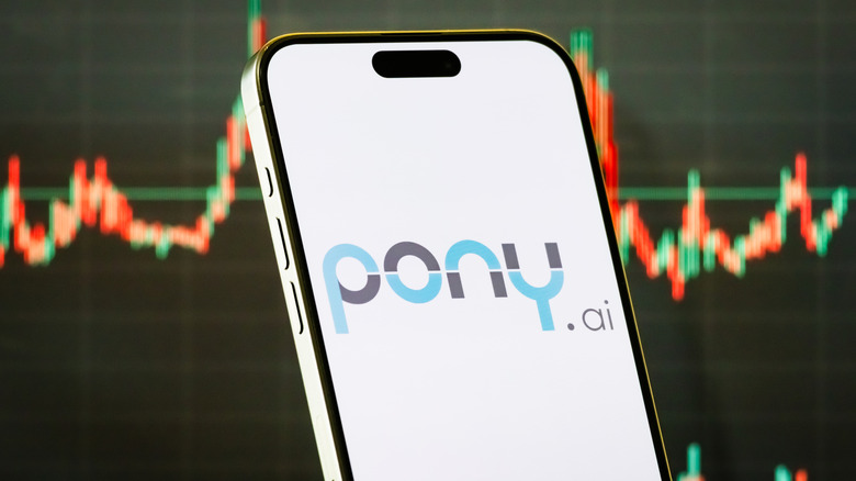 a phone showing the logo for Pony.ai