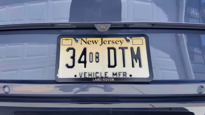 New Jersey manufacturer plate 34 08 DTM on the back of Tim Esterdahl's Range Rover
