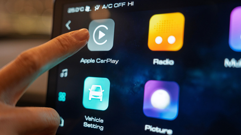An infotainment system's screen showing the button for Apple CarPlay