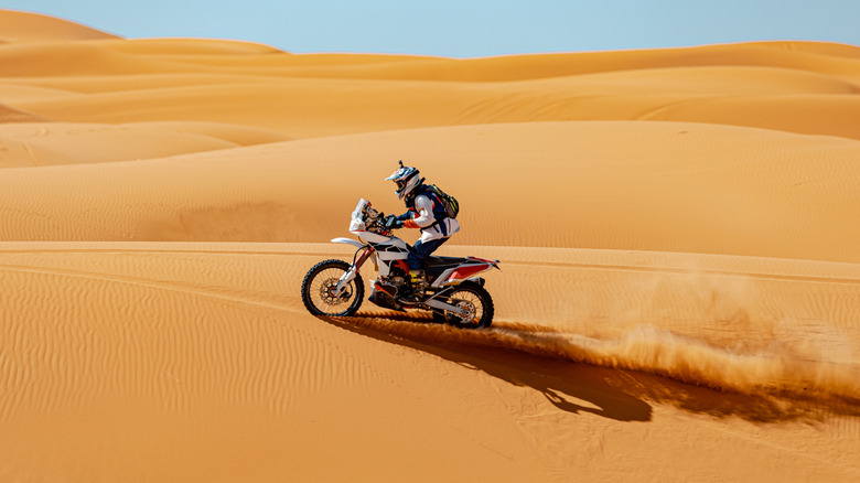 A motocross rider in the sands of Morocco