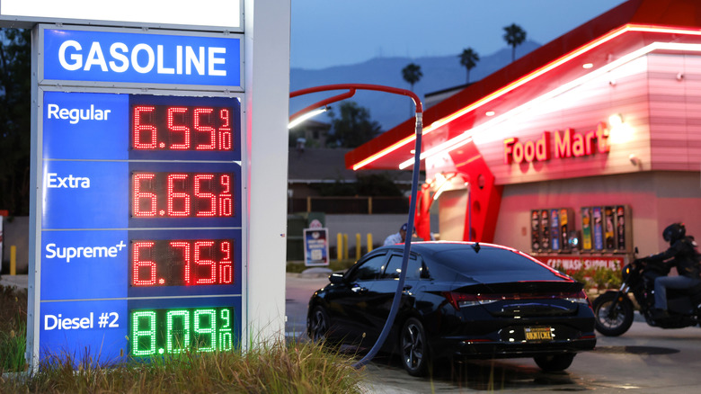 PASADENA, CALIFORNIA - MARCH 30: Gas prices are displayed at a Mobil gas station on March 30, 2026 in Pasadena, California. The average price of one gallon of regular self-service gasoline rose to $5.99 today in Los Angeles County, climbing from $4.69 one month ago, amid the ongoing war with Iran. (Photo by Mario Tama/Getty Images)