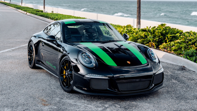 Porsche 911R street parked by the ocean