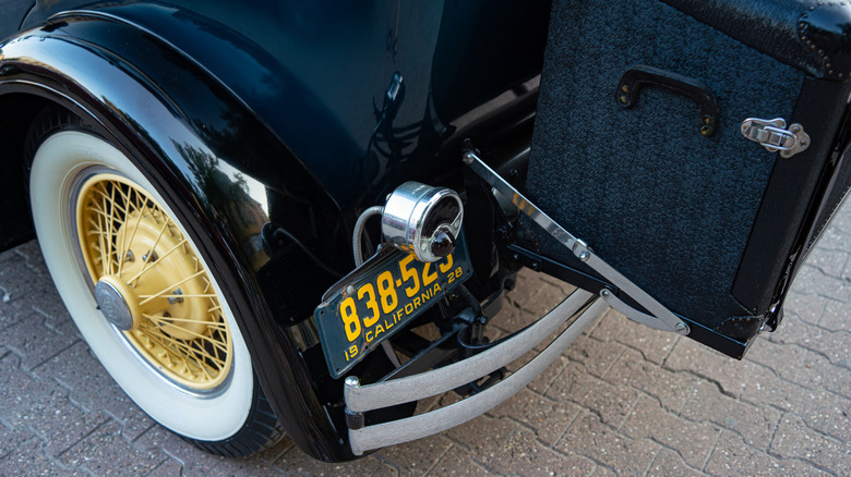 1928 California license plate on vintage vehicle.