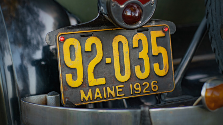 1926 Maine original license plate on a vintage vehicle.