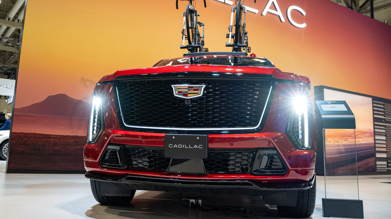 Red Cadillac Escalade-V successful a parking lot