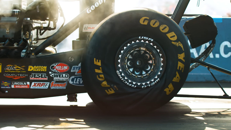 A Goodyear drag racing tire deforming under acceleration