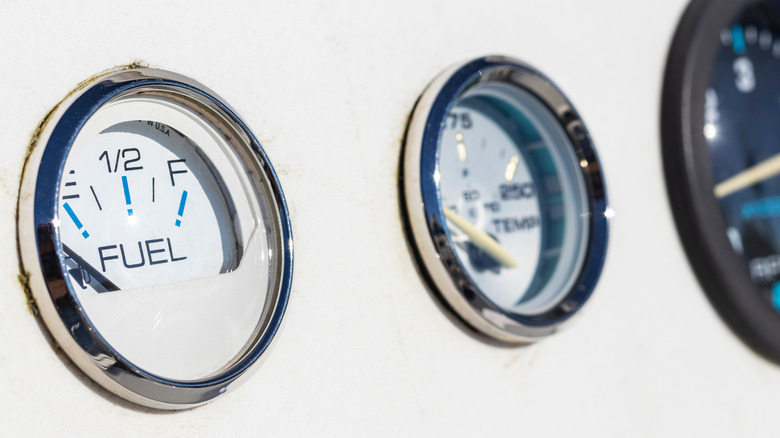 Close-up of a boat's fuel gauge.