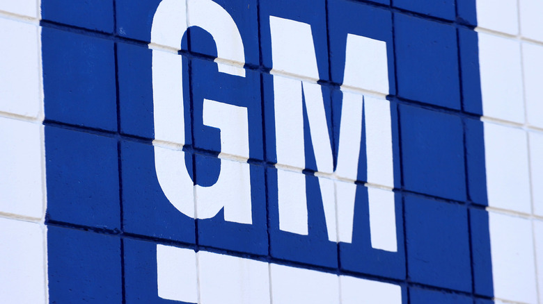 The General Motors logo is displayed at a Chevrolet dealership on August 4, 2021 in Burbank, California.