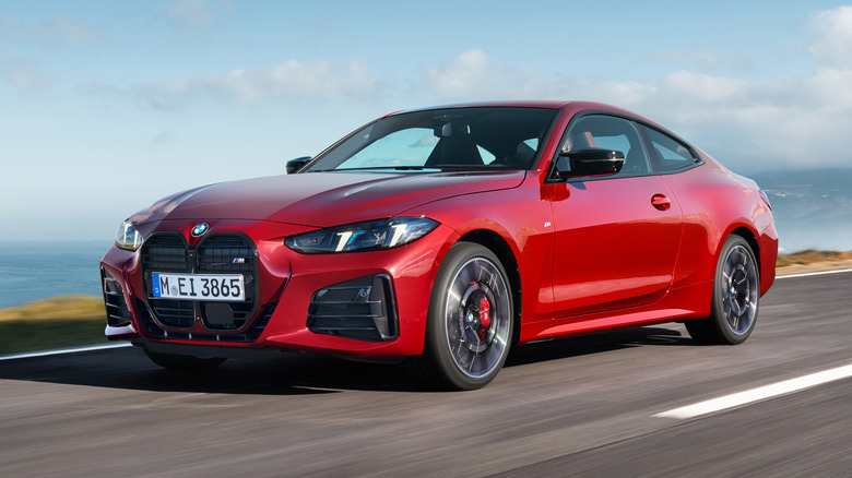 Front 3/4 view of a red BMW 4 Series coupe