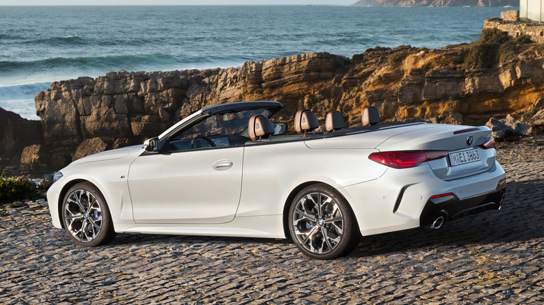 Rear 3/4 view of a white BMW 4 Series convertible