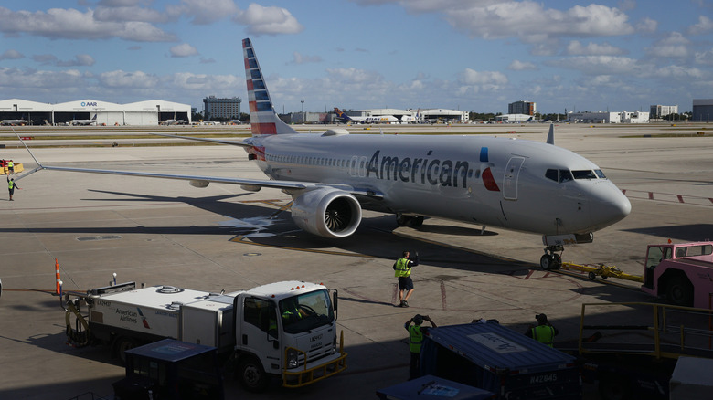 A Boeing 737 operated by American Airlines at the terminal in Miami International Airport