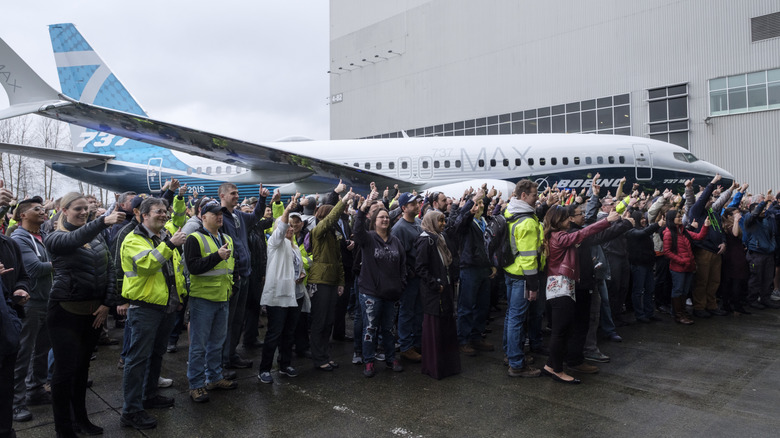 Boeing employees celebrate the first test flight of the 737 Max 7 all the way back in 2018