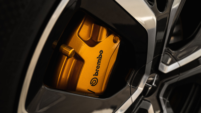 Yellow Brembo brakes on a sportscar