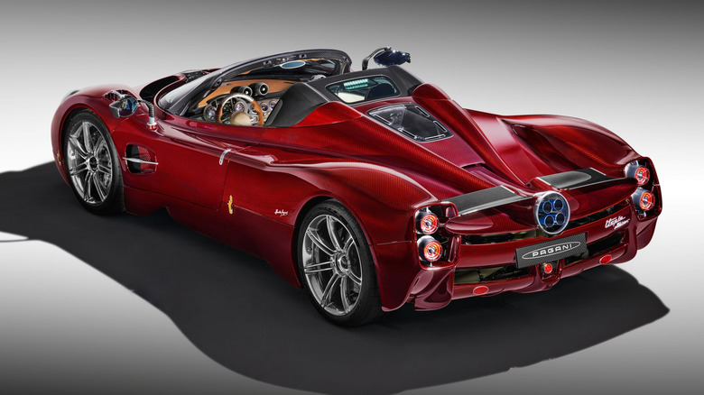 A red Pagani Utopia Roadster shown in rear three-quarter view