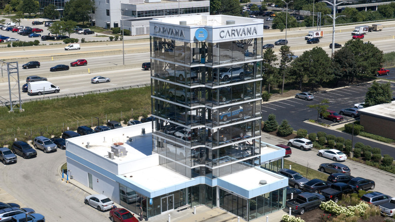 OAK BROOK, ILLINOIS - JULY 30: An aerial view shows a Carvana vending tower on July 30, 2026 in Oak Brook, Illinois.