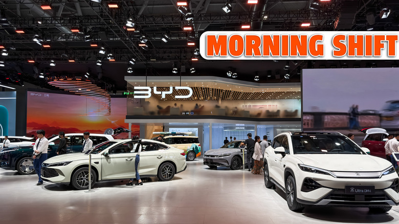 SHENZHEN, CHINA - JUNE 3: Visitors view BYD vehicles at the company's booth during the 30th Guangdong-Hong Kong-Macao Greater Bay Area Auto Show on June 3, 2026, in Shenzhen, Guangdong Province, China. The annual auto show showcases new vehicle models, electric mobility technologies and automotive innovations, highlighting the rapid growth of China's new energy vehicle industry. (Photo by Cheng Xin/Getty Images)