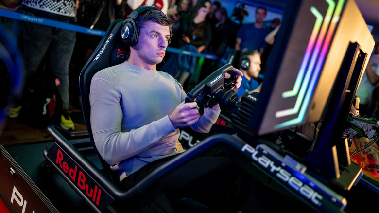 Max Verstappen racing on a simulator