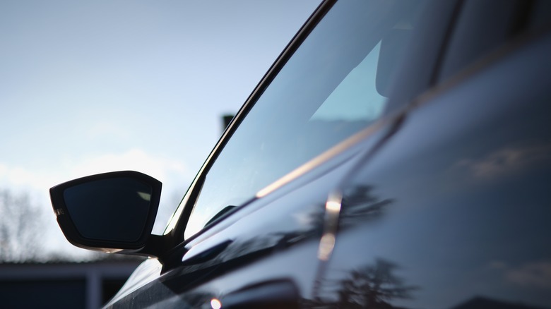 A picture of a tinted driver side window