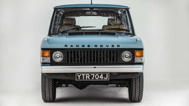 A Range Rover Classic in light blue