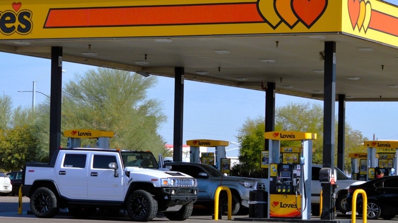 Cars fueling up at a Love's truck stop
