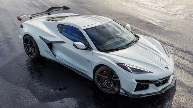Top three-quarter view of a white Corvette, parked.