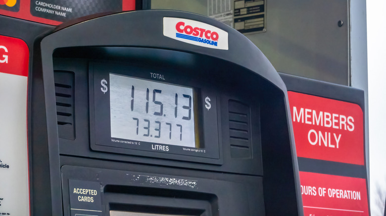 A close-up of a Costco fuel pump displaying price and volume dispensed, in Calgary, Alberta, Canada.