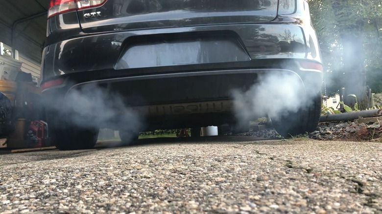 An example of white exhaust smoke due to a blown head gasket