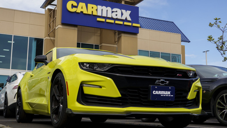 SAN DIEGO, CALIFORNIA - NOVEMBER 11: A used Chevrolet Camaro for sale is displayed at a CarMax dealership on November 11, 2025 in San Diego, CA.