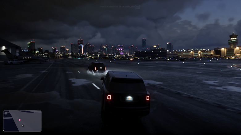 A black Rolls-Royce Cullinan-like SUV in a convoy drives off an airport runway in GTA6.