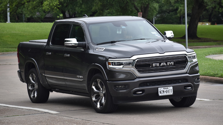 A Ram 1500 in a parklike setting.