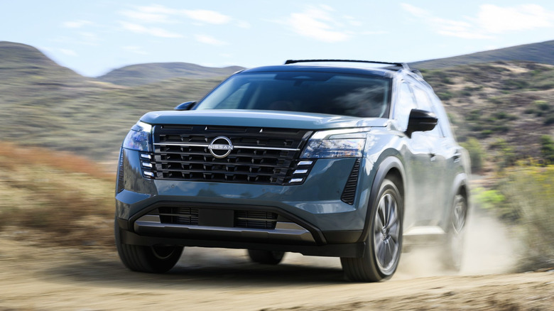 Nissan pathfinder driving through the desert