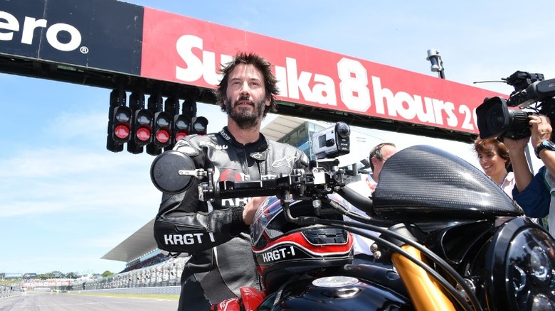 Keanu Reeves on a bike at the Suzuka 8 Hours