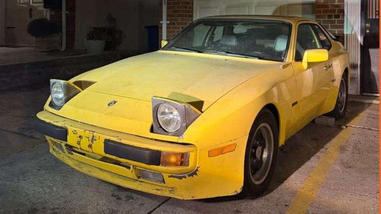 A yellow Porsche 944 hatch