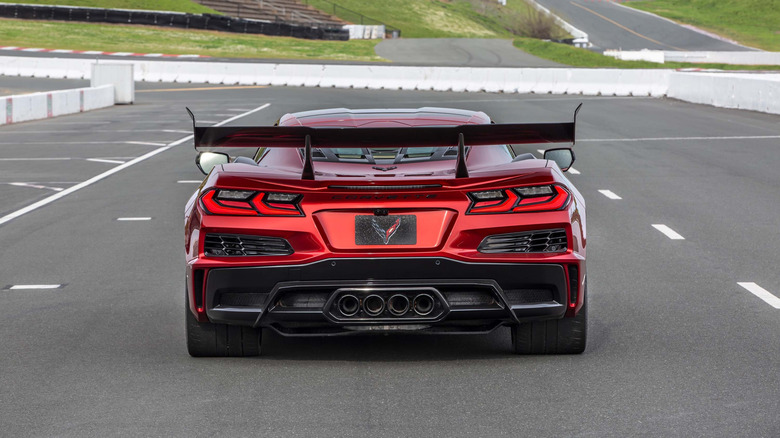Rear view of a red 2026 Chevy Corvette ZR1X on a race track