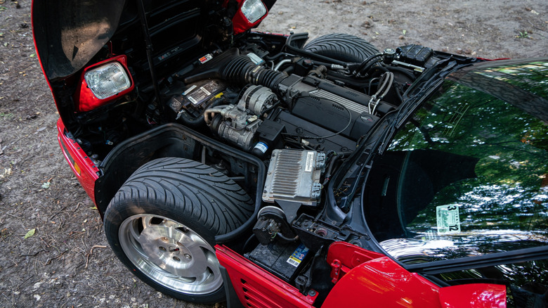 A red Chevrolet Corvette C4 with 5.7-liter LT1 V8