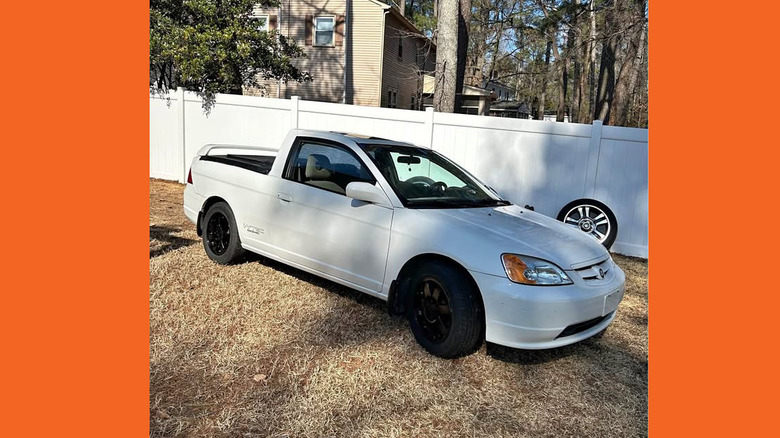 A white Honda Civic ute