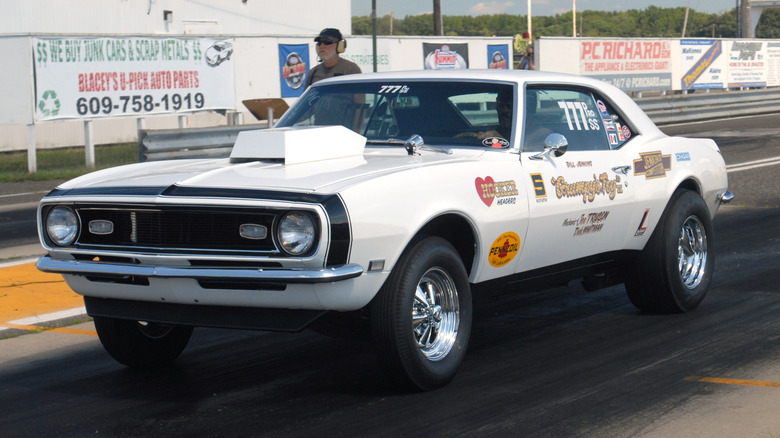 Bill Jenkins' famous "Grumpy's Toy II" Pro Stock Chevy Camaro leaves the start line during a vintage drag racing event in Englishtown, New Jersey.