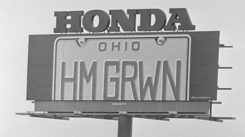 This billborard depicting an enormous Ohio license plate with the letters "HMGRWN" -- "Home Grown" -- was erected on U.S. 33 by Japan's Honda Motor Co., near the auto and motorcycle plant it built outside Marysville.