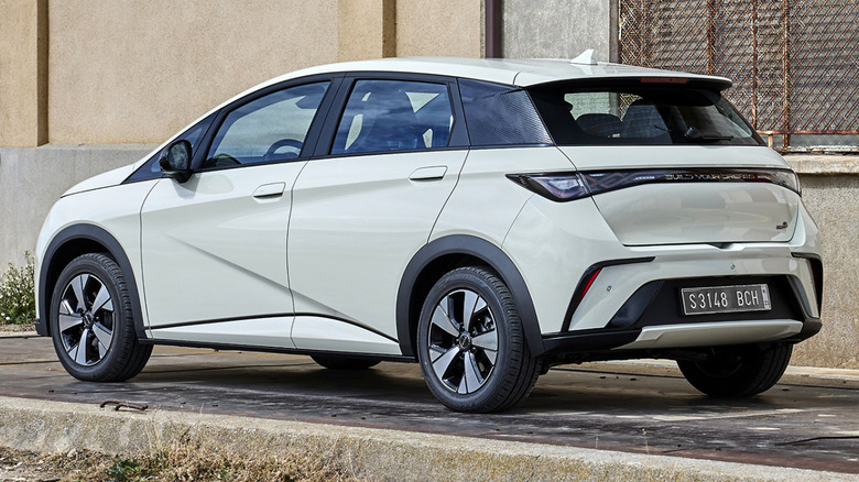 Rear-quarter shot of a white BYD Dolphin