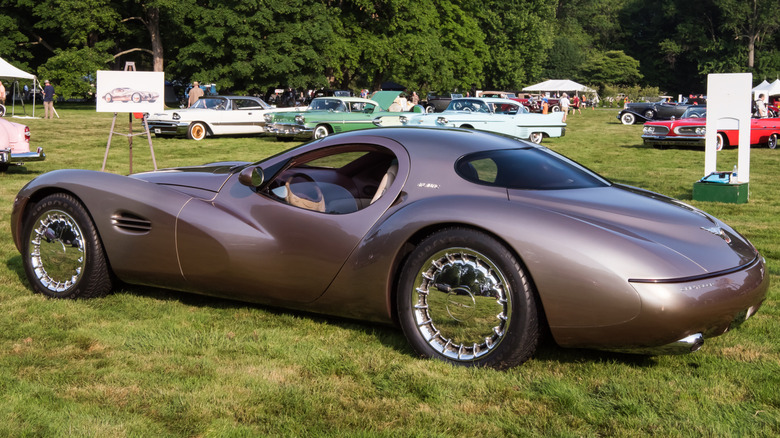 The 1995 Chrysler Atlantic Concept on in a grassy field at an auto show.