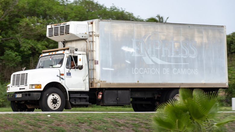 A Class 6 delivery truck in a residential area