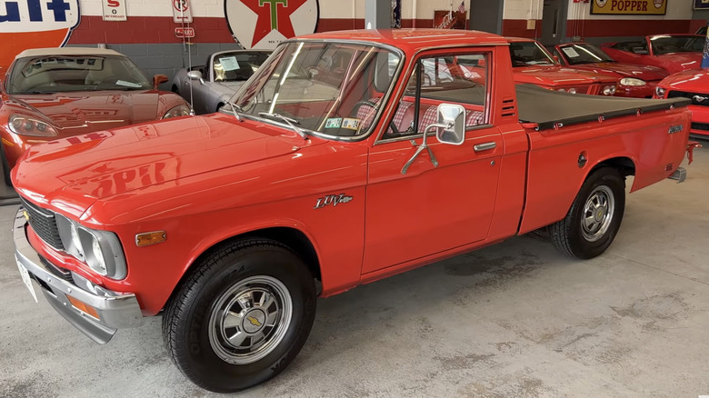 A 1976 Chevrolet LUV pickup truck finished in red.