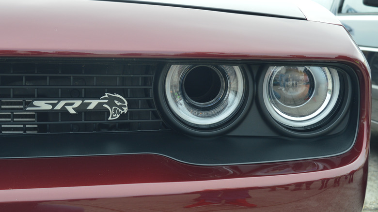 The Hellcat logo on the front of a Dodge Challenger