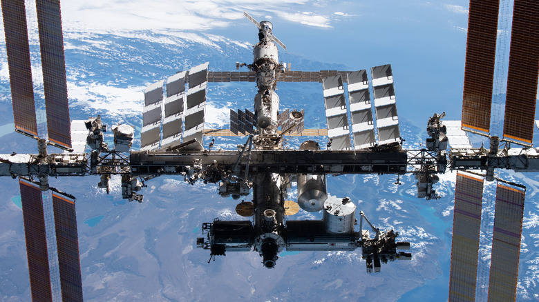 The International Space Station (ISS) with the Earth below it