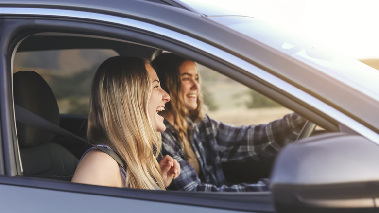Teenage girls traveling in a car