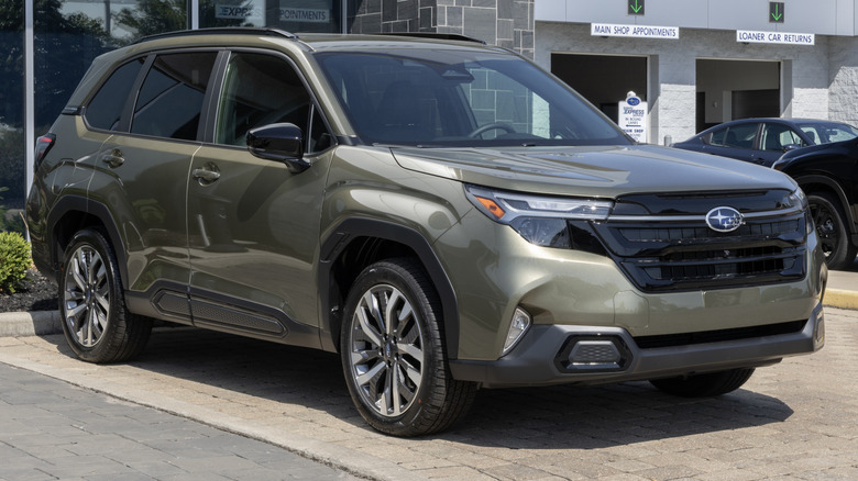 2026 Subaru Forester in front of a dealership.