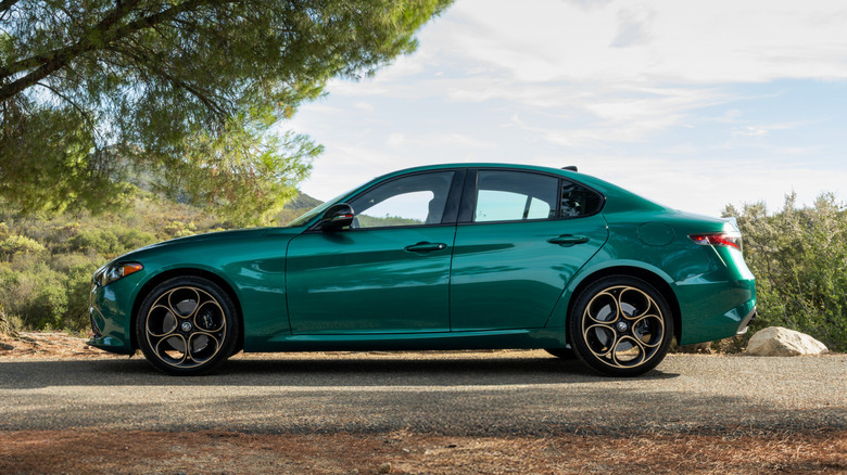 A 2025 Alfa Romeo Giulia Intensa parked under a tree